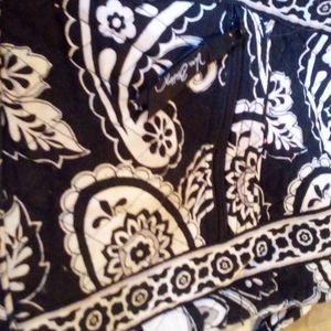 Vera Bradley Black and lavender bohomeian printed sak purse.